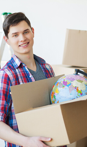 Happy customer with moving boxes